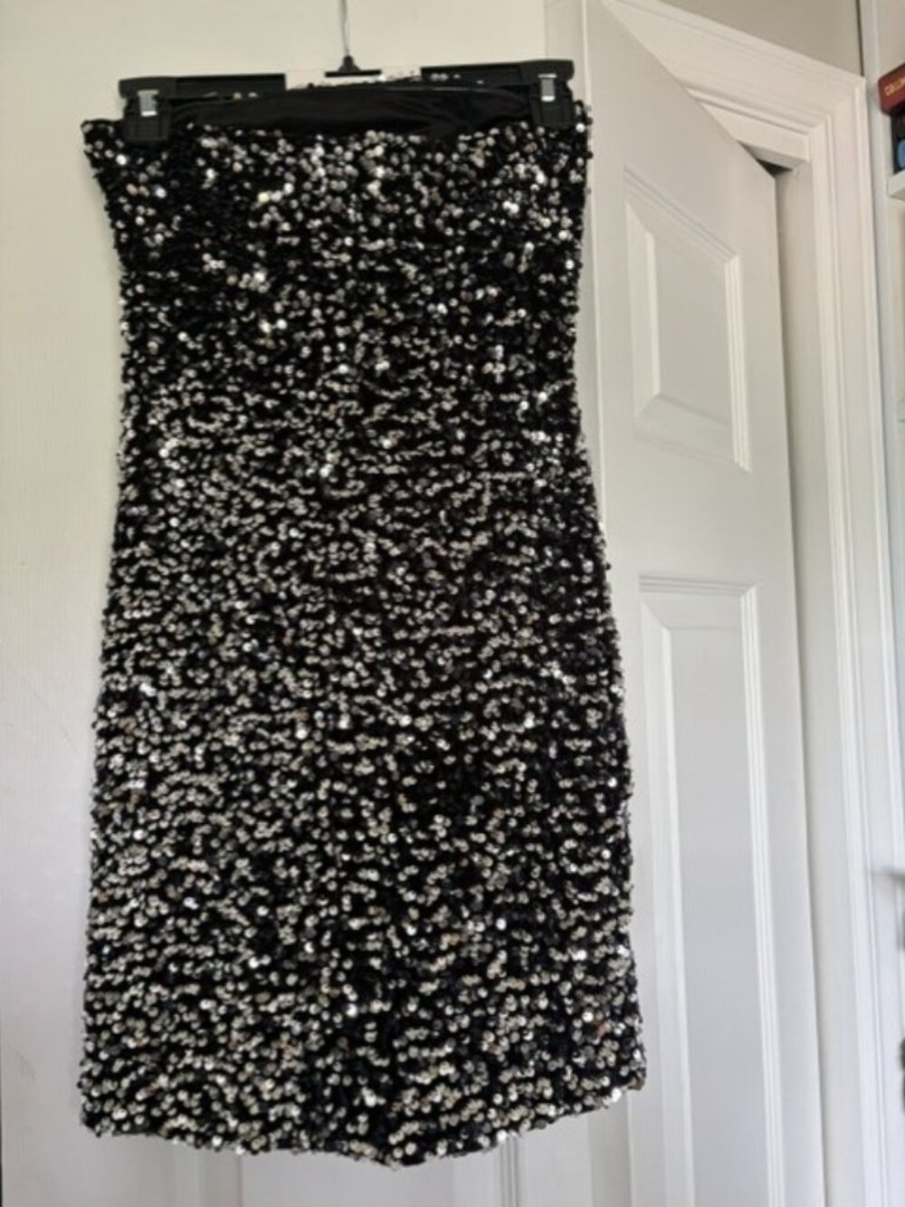 Black and silver sequined mini dress with matching bag